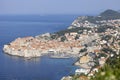 Aerial view of Old Town (Stari Grad), city walls and a port for tourist ships by Adriatic Sea, Dubrovnik, Croatia Royalty Free Stock Photo